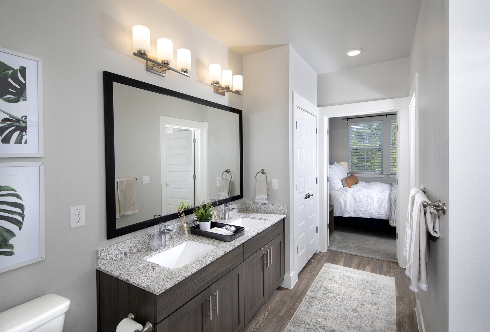 a bathroom with two sinks at a senior apartment community